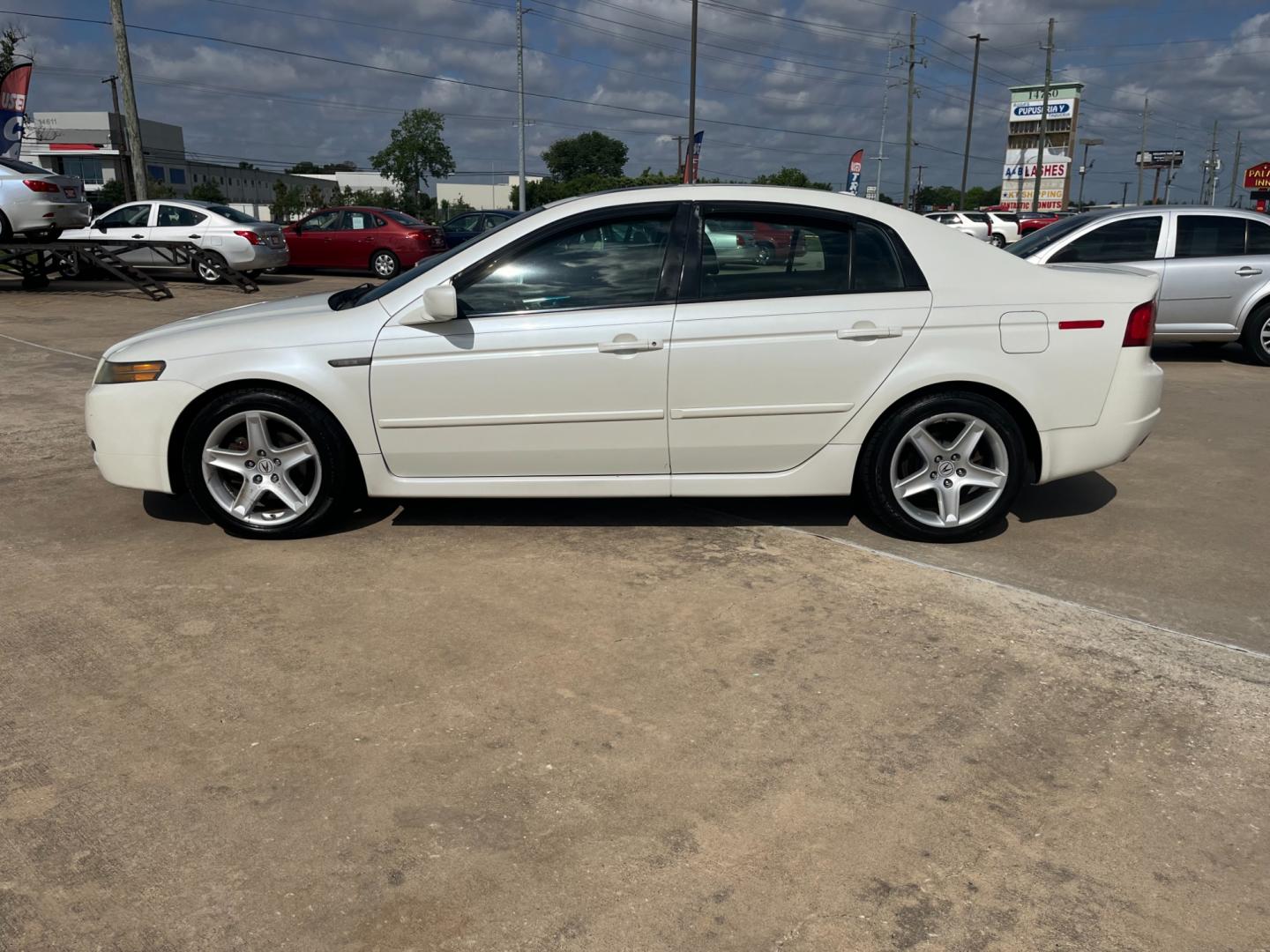 2006 white /TAN Acura TL 5-Speed AT (19UUA66206A) with an 3.2L V6 SOHC 24V engine, 5-Speed Automatic Overdrive transmission, located at 14700 Tomball Parkway 249, Houston, TX, 77086, (281) 444-2200, 29.928619, -95.504074 - Photo#3